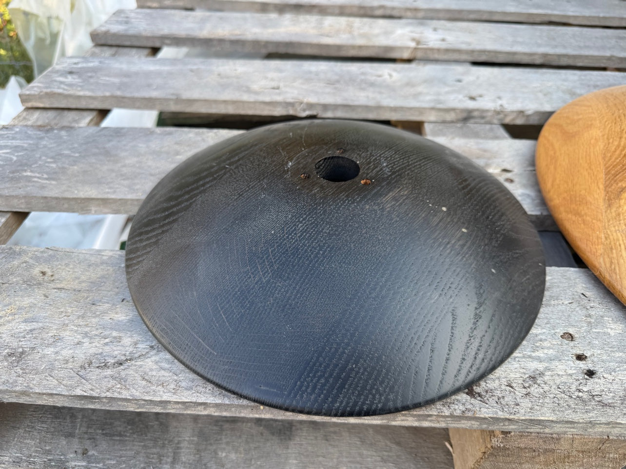 Detail of a turned piece, black finish