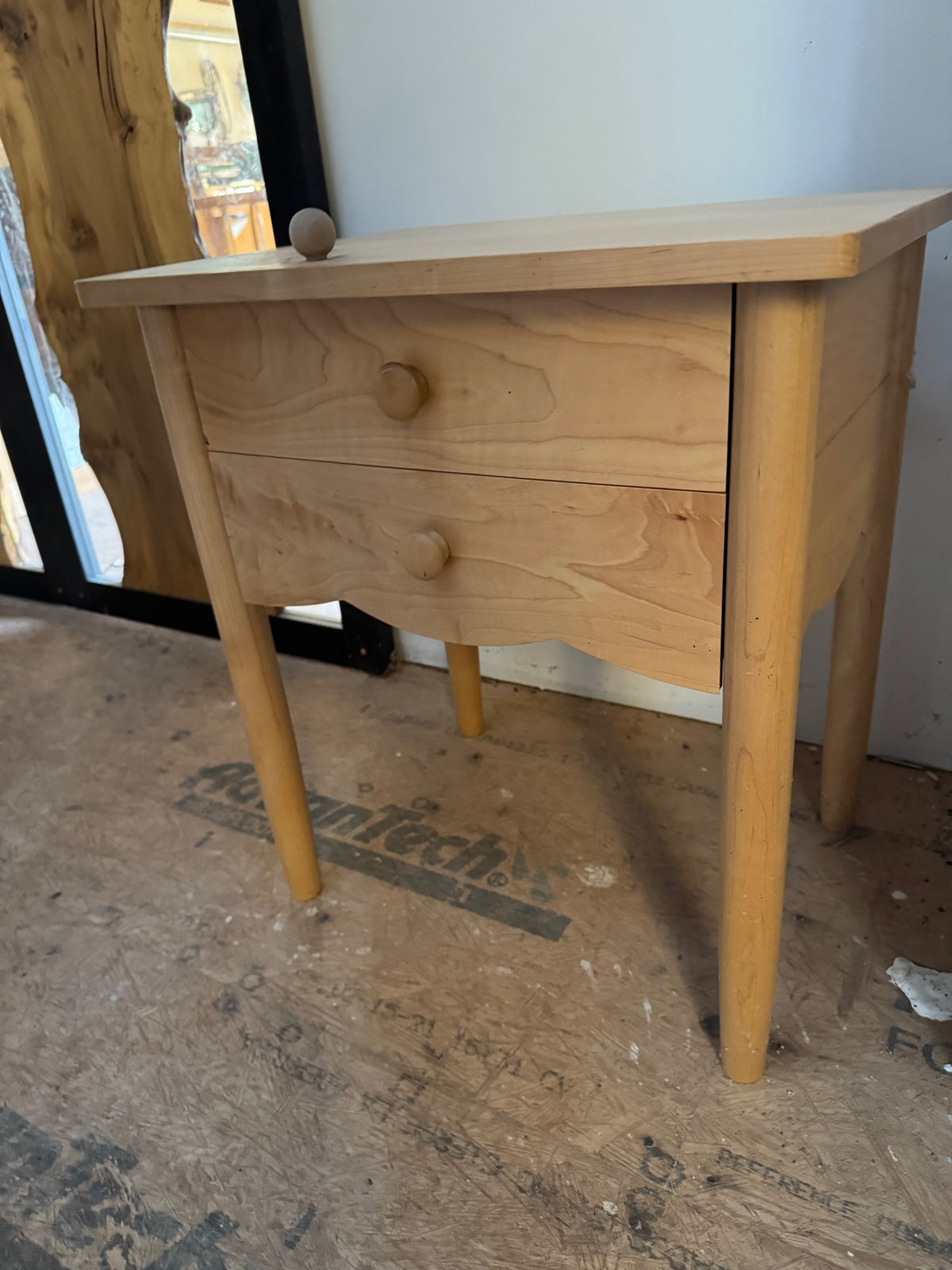 Two-drawer solid-wood nightstand, front view